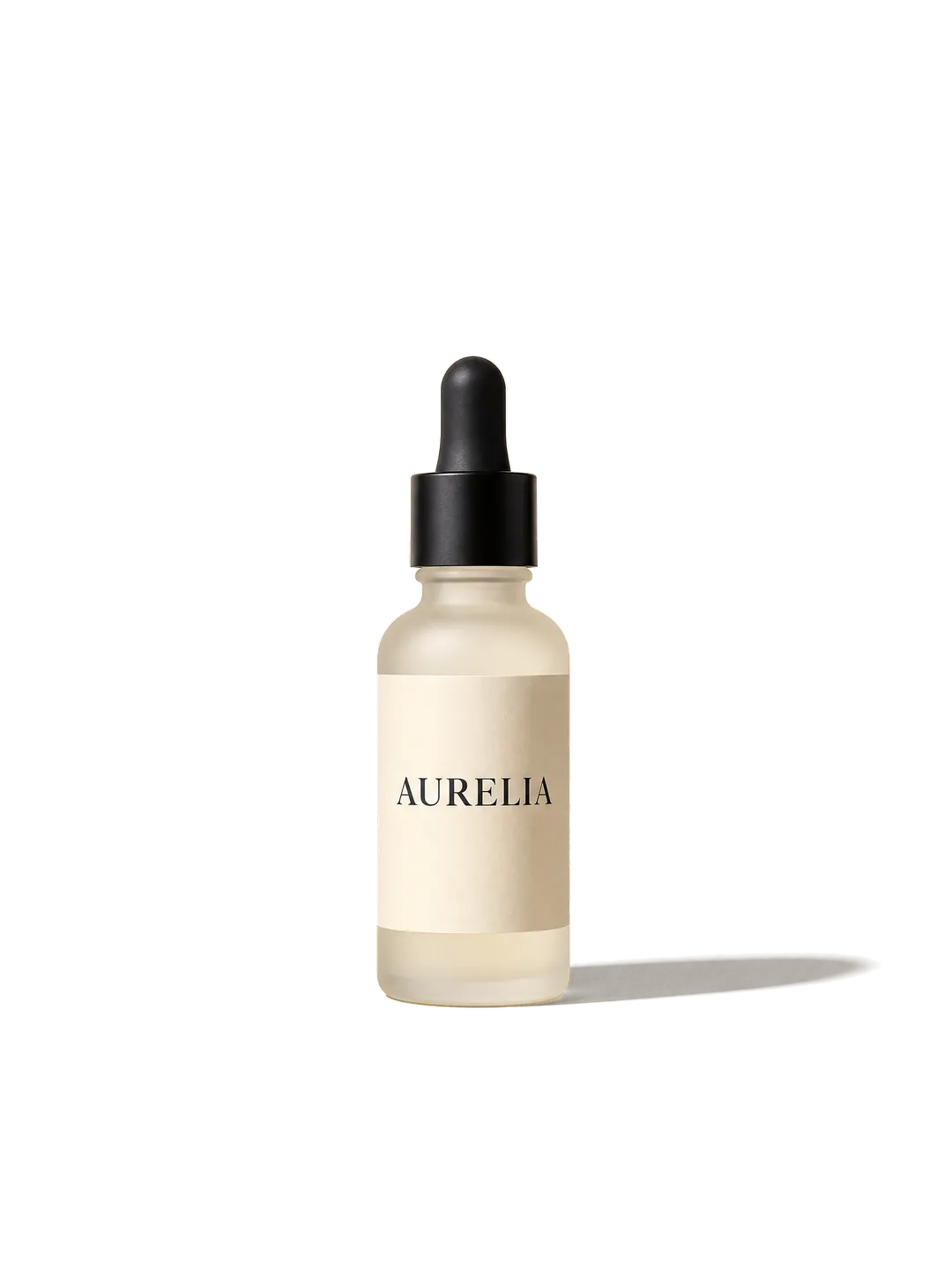 product layer — frosted glass dropper bottle with a paper label